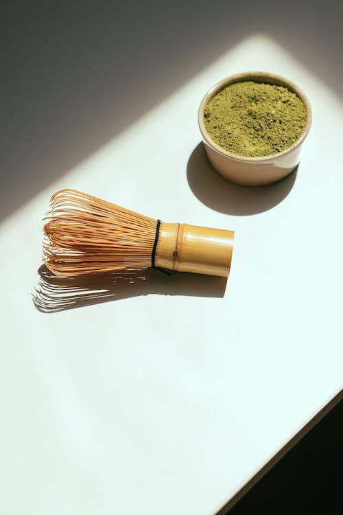 Free Matcha Powder and a Bamboo Whisk Stock Photo